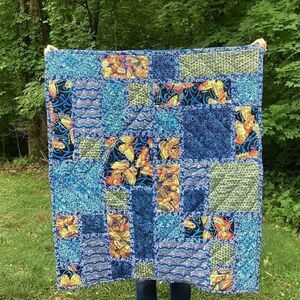 NWT. Hand Crafted Blue Butterflies Lap Quilt